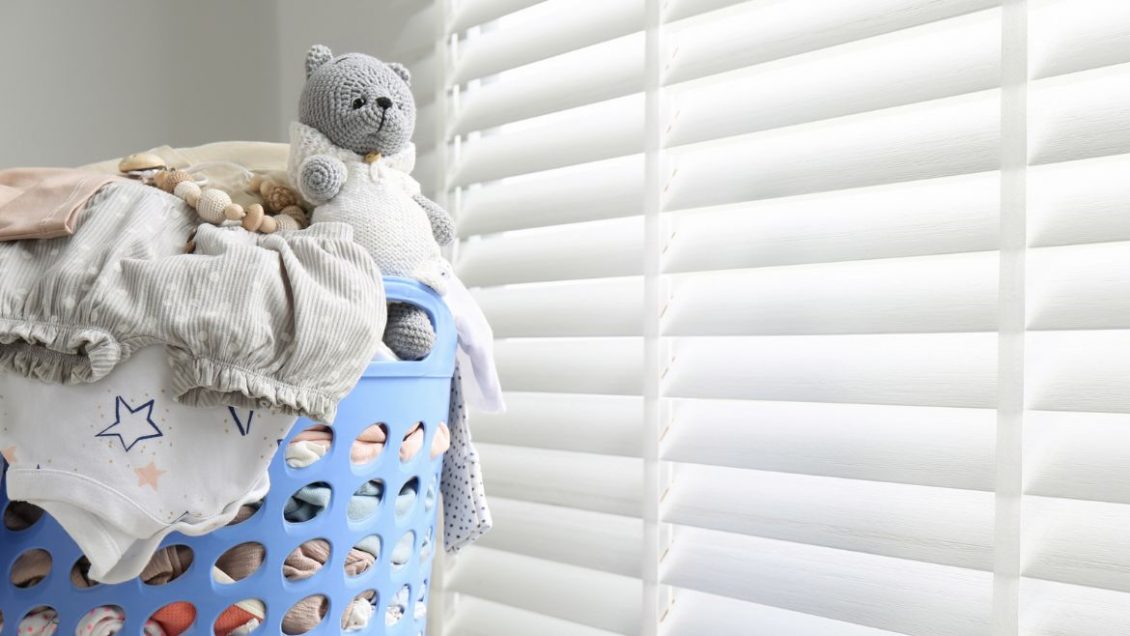 Photo of a crocheted bear in a laundry basket