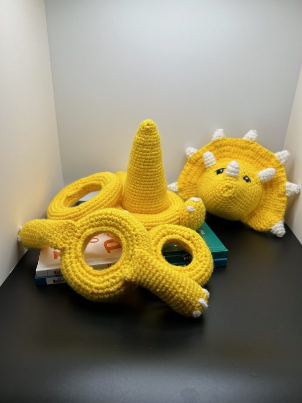Photo of a Crocheted baby ring toy in yellow