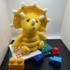 Photo of a Crocheted baby ring toy in yellow