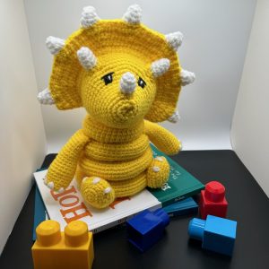 Photo of a Crocheted baby ring toy in yellow