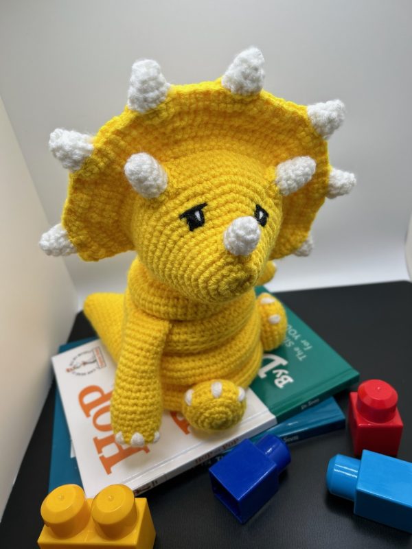 Photo of a Crocheted baby ring toy in yellow
