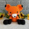 Photo of a bright orange stuffed fox