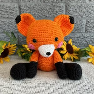 Photo of a bright orange stuffed fox