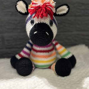 Handmade crocheted rainbow zebra