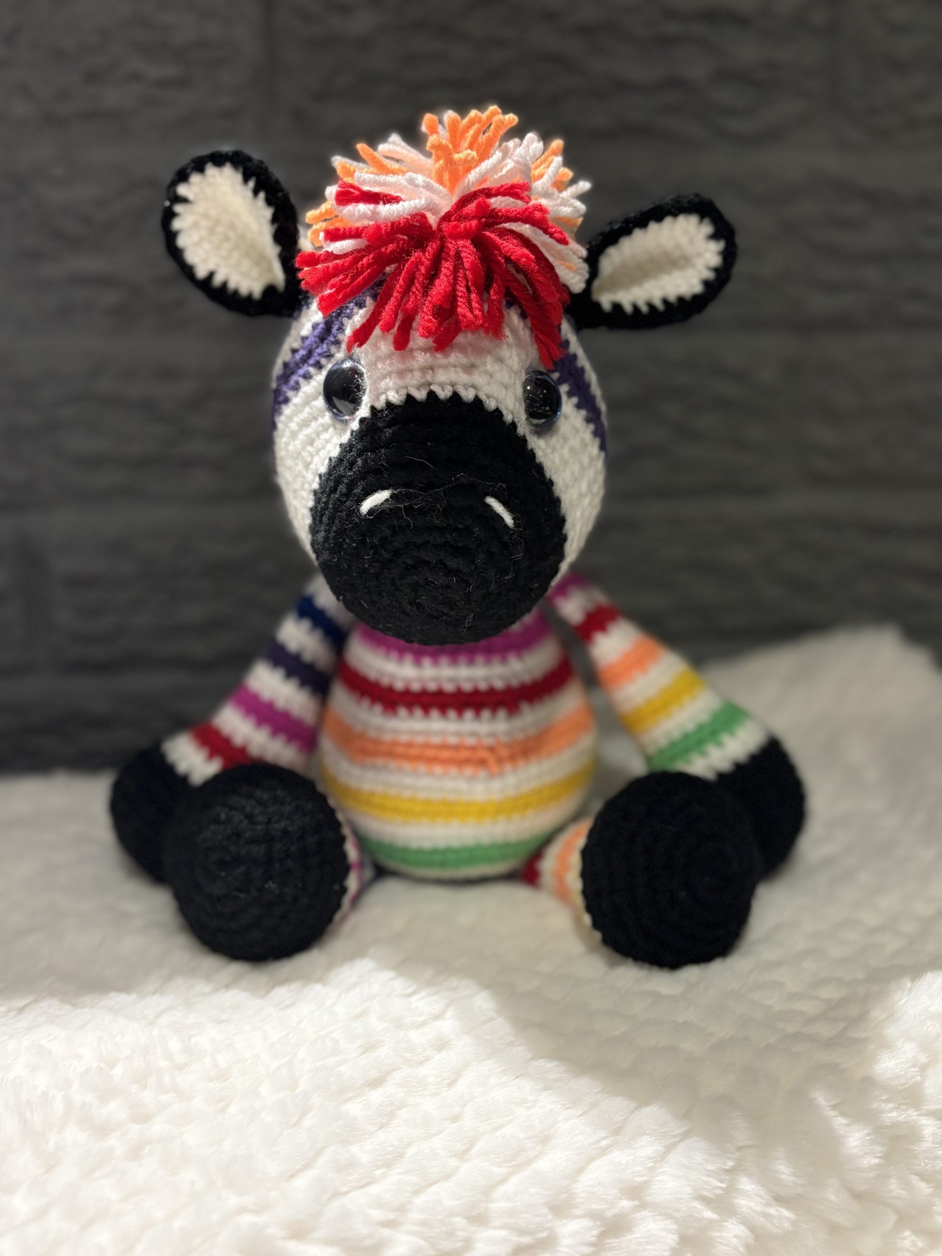 Handmade crocheted rainbow zebra