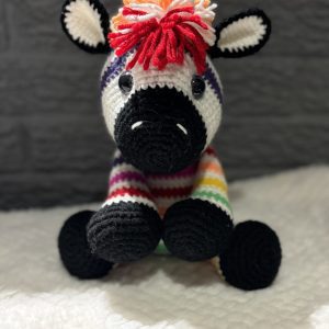 IMG_9251-scaled-1.jpg Close-up of handmade crocheted rainbow zebra