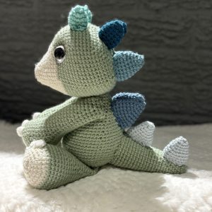IMG_9258-scaled-1.jpg Side view of handmade crochet dinosaur plush