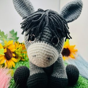 crochet-donkey-jj4.jpg Close-up of handmade crocheted stuffed donkey