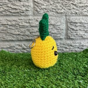 crochet-pineapple-keychain-jj2.jpg Side view of handmade crochet pineapple keychain