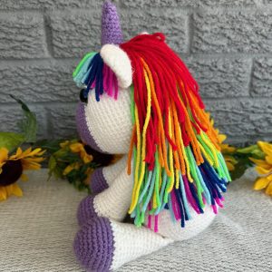 crochet-stuffed-unicorn-jj2.jpg Side view of handmade crocheted stuffed unicorn