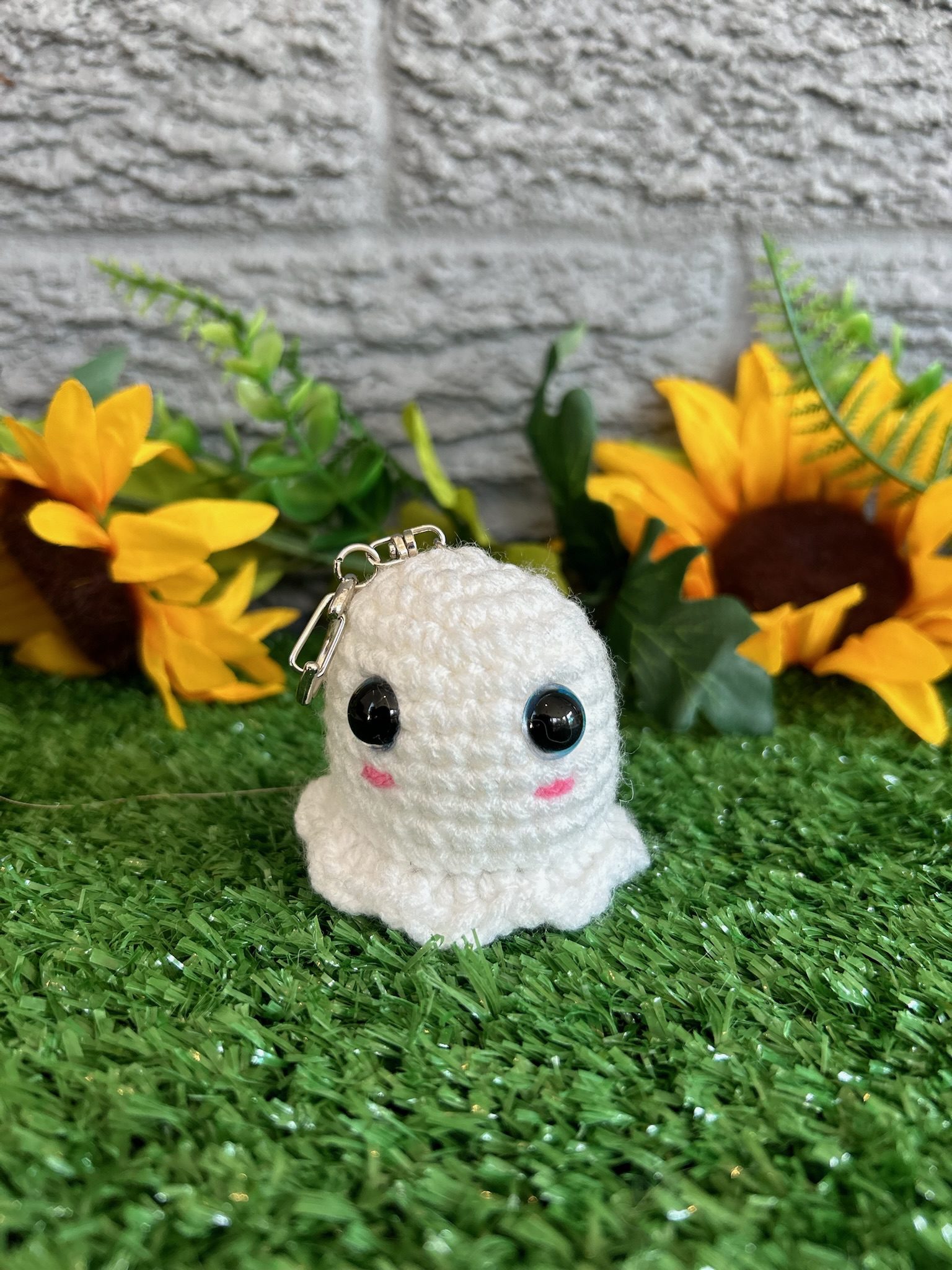 Second view of handmade crochet baby ghost keychain