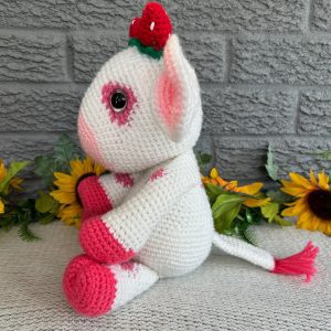 crocheted-strawberry-cow-jj4.jpg Side view of handmade crocheted strawberry cow