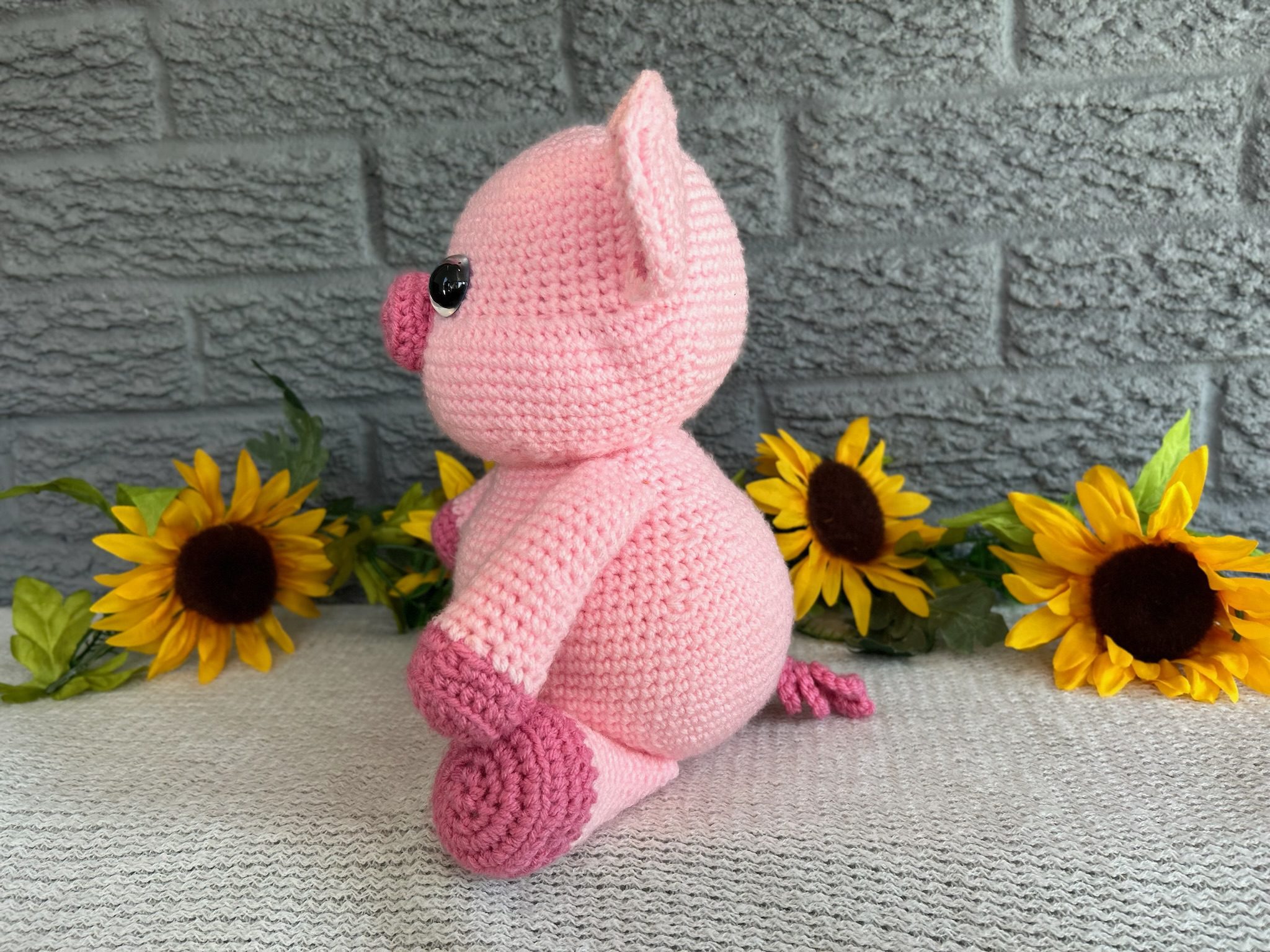 side view of handmade crocheted stuffed pig