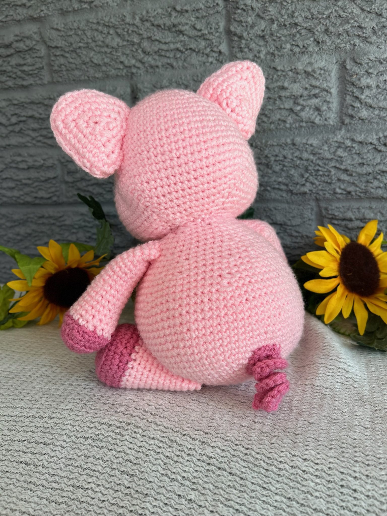back view of handmade crocheted stuffed pig