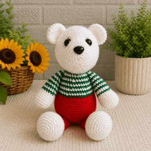 Handmade crochet holiday polar bear plush