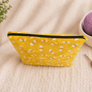 ChatGPT Image Jun 26, 2026, 05_51_17 PM Top view of handmade bee zipper pouch