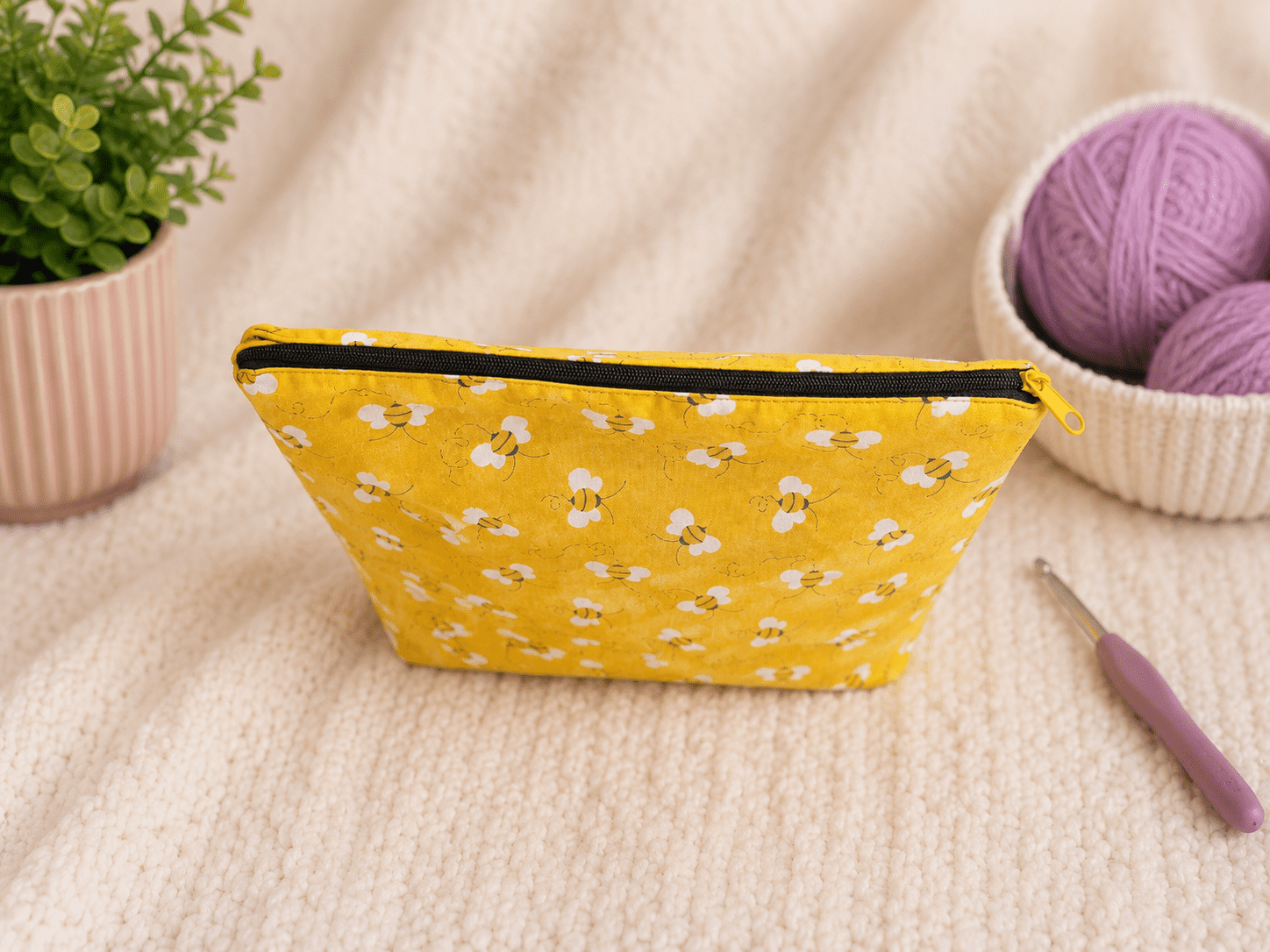Top view of handmade bee zipper pouch