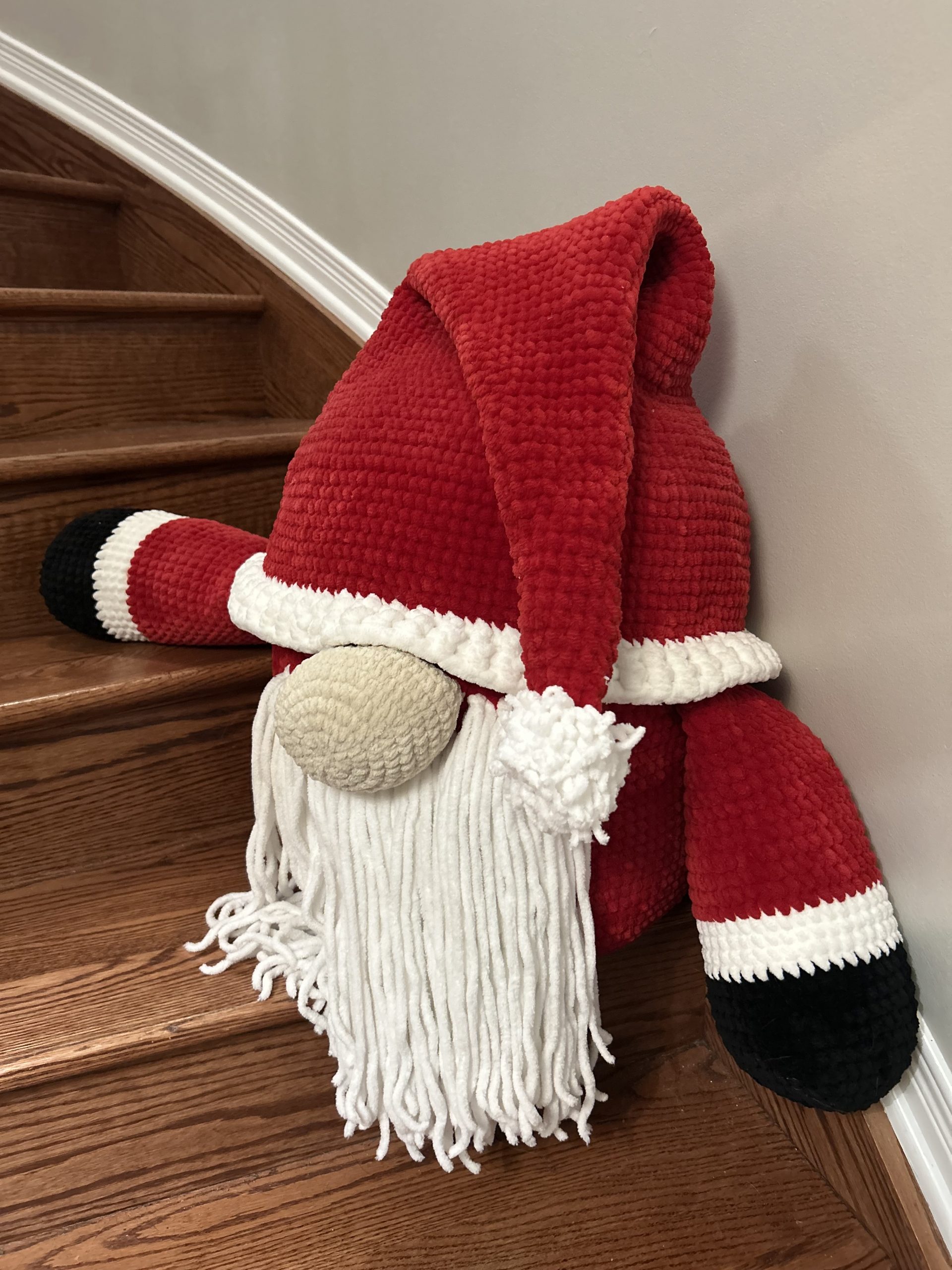 Second view of giant handmade crocheted santa gnome