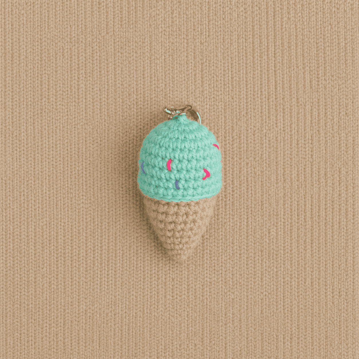Top view of handmade crochet ice cream cone keychain