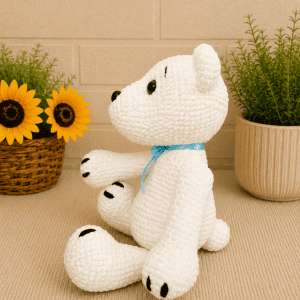Side-crocheted-polar-bear Image Jul 4, 2026, 12_50_09 AM Side profile of handmade crochet polar bear.